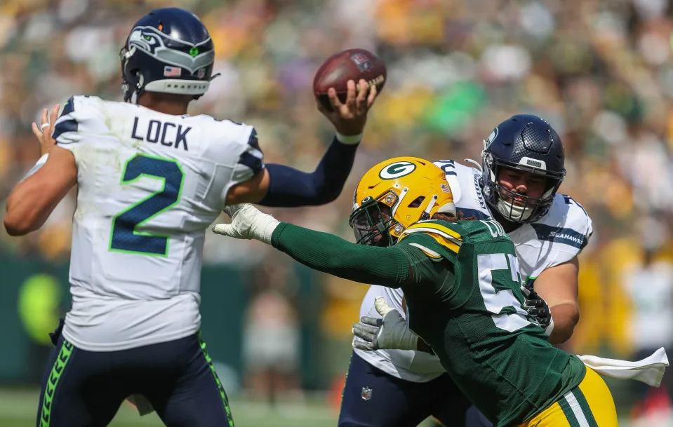 Green Bay Packers linebacker Brenton Cox Jr. (57) pressures <a class="link " href="https://sports.yahoo.com/nfl/teams/seattle/" data-i13n="sec:content-canvas;subsec:anchor_text;elm:context_link" data-ylk="slk:Seattle Seahawks;sec:content-canvas;subsec:anchor_text;elm:context_link;itc:0"&gtSeattle Seahawks</a> quarterback <a class="link " href="https://sports.yahoo.com/nfl/players/31874" data-i13n="sec:content-canvas;subsec:anchor_text;elm:context_link" data-ylk="slk:Drew Lock;sec:content-canvas;subsec:anchor_text;elm:context_link;itc:0"&gtDrew Lock</a> (2) during their preseason football game on Saturday, August 26, 2023, at Lambeau Field in Green Bay, Wis. The Packers won the game, 19-15.<br&gtTork Mason/USA TODAY NETWORK-Wisconsin