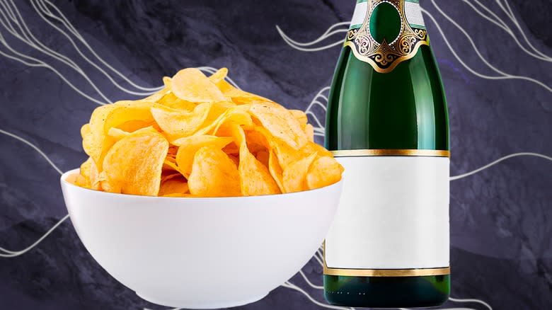 A bowl of potato chips and a bottle of champagne