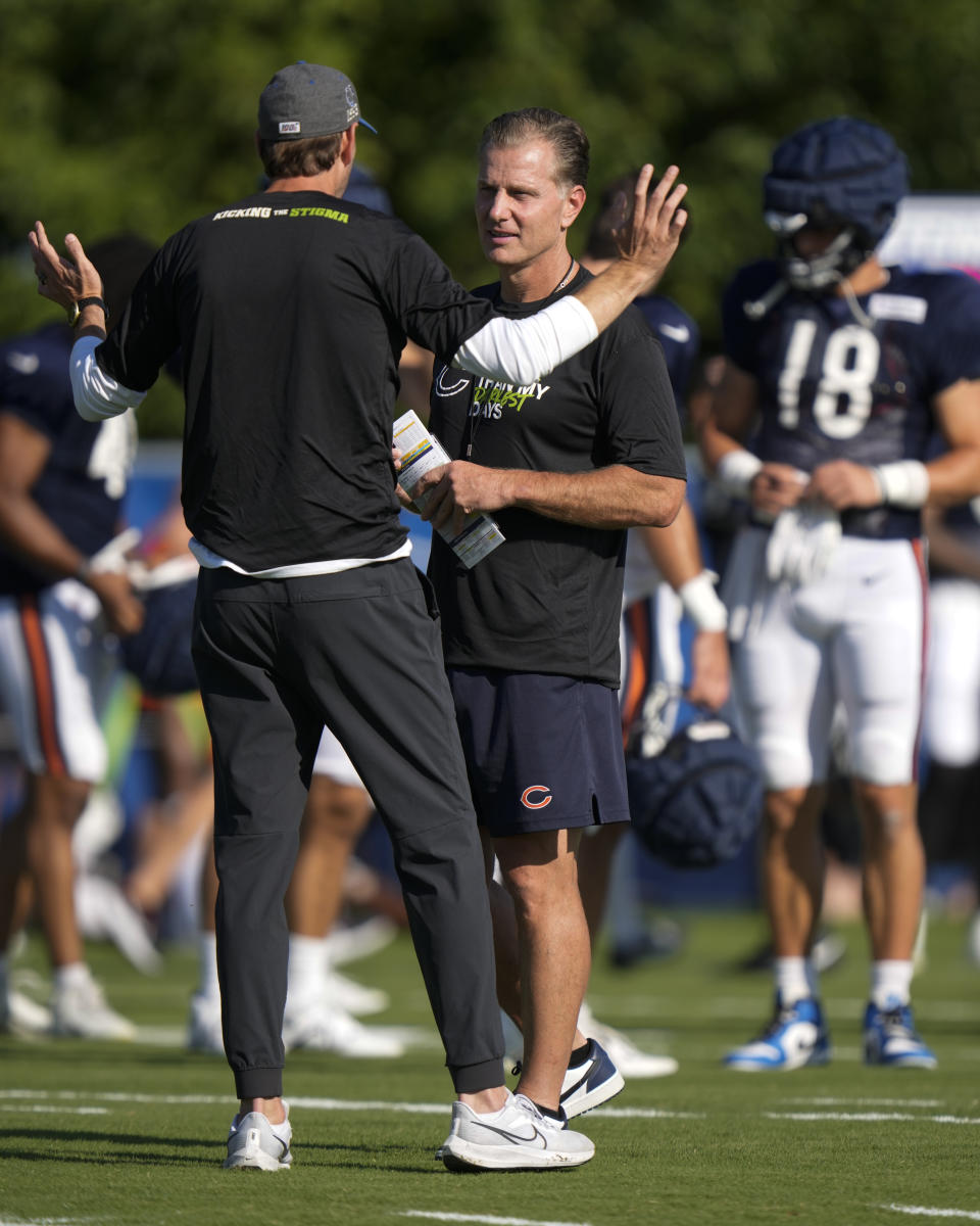 Chicago Bears coach Matt Eberflus, right, talks with Indianapolis Colts coach Shane Steichen during an NFL football joint practice at the Colts' training camp in Westfield, Ind., Wednesday, Aug. 16, 2023. (AP Photo/Michael Conroy)