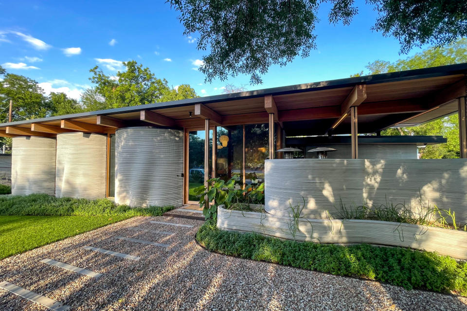 Exterior of House Zero, a 2,000-square-foot, three-bedroom, 2.5-bath home with a 350 square-foot accessory dwelling unit in Austin, Texas, featuring Austin-based ICON’s 3D-printed wall system, on Tuesday, June 18, 2024.