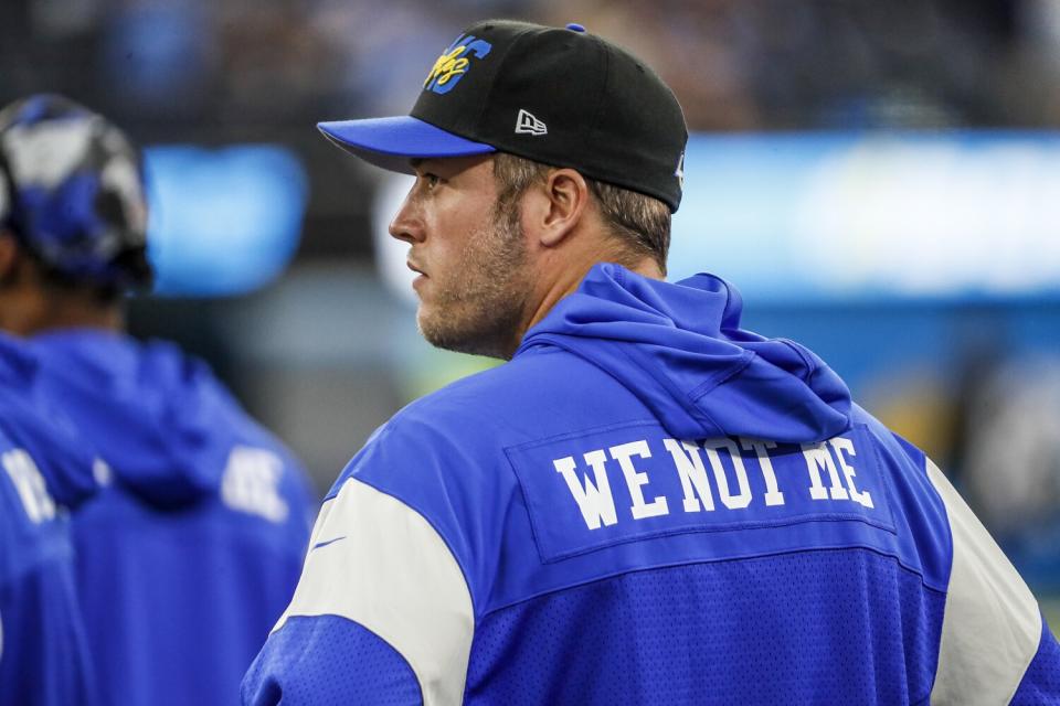 Rams quarterback Matthew Stafford stands on the sideline.