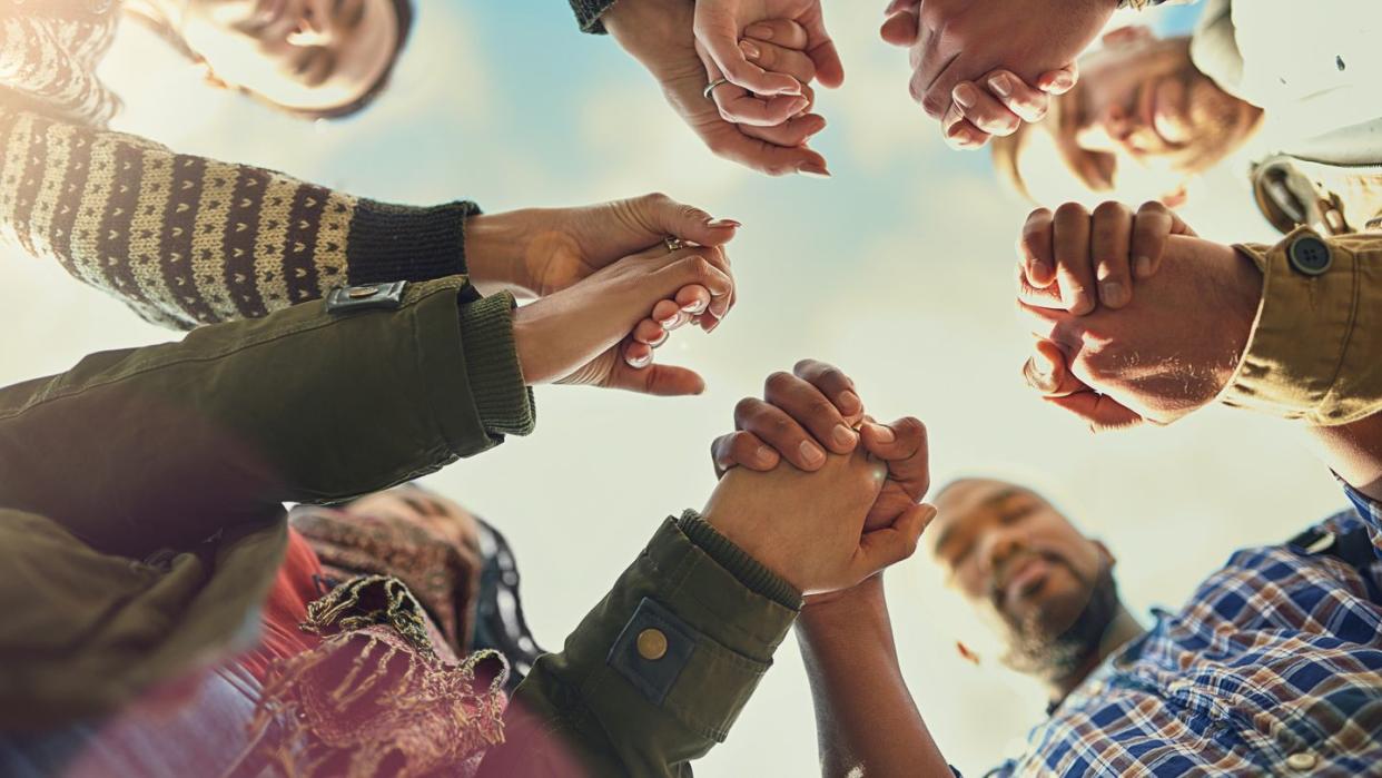 a prayer group of family members and friends