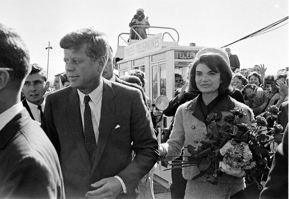 FILE - This Nov. 22, 1963 file photo shows President John F. Kennedy and his wife Jacqueline Kennedy upon their arrival at Dallas Airport, in Dallas, shortly before President Kennedy was assassinated. The TLC network is making a movie about some of the 800,000 condolence letters that were sent to the widow of former President John F. Kennedy after his 1963 assassination. “Letters to Jackie” will air this fall, as the 50th anniversary of Kennedy's killing approaches on Nov. 22. (AP Photo, file)