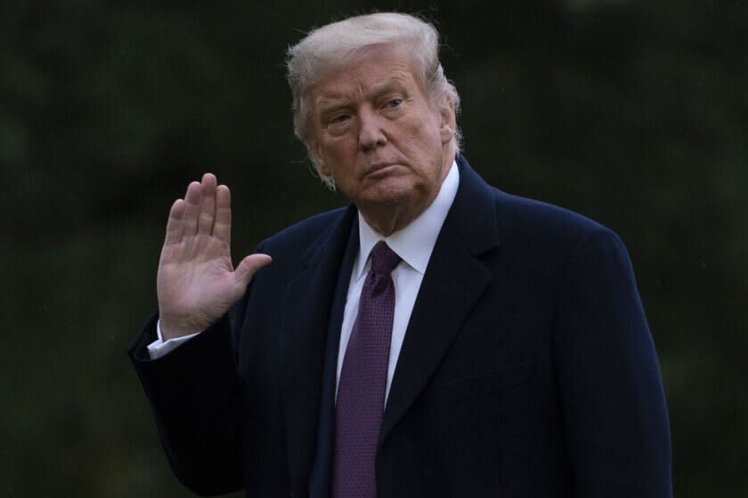 President Trump arrives at the White House on Thursday after returning from Bedminster, N.J.