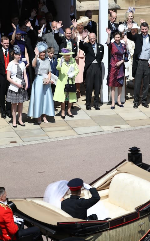 Prince Harry salutes members of the Royal family - Credit: Andrew Milligan /PA