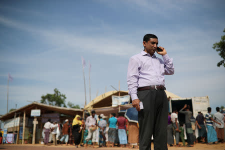 Mohib Ullah, a leader of Arakan Rohingya Society for Peace and Human Rights, talks on the phone in Kutupalong camp in Cox's Bazar, Bangladesh April 7, 2019. REUTERS/Mohammad Ponir Hossain