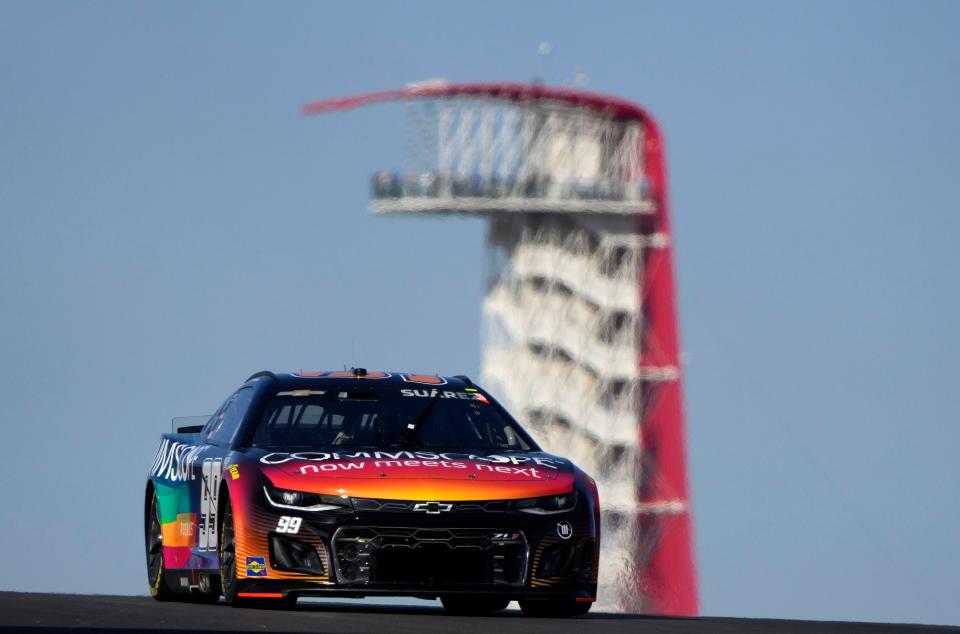 NASCAR Cup Series driver Daniel Suarez zips past the tower Saturday in qualifying for the EchoPark Automotive Texas Grand Prix at Circuit of the Americas. Suarez, from Mexico, says the race in Austin is one of the few his friends and family can attend.