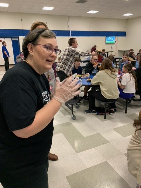 Marilyn Rosenwarne, director of dining services for Chartwells food-service company, reminded students to vote on their favorite dish served Wednesday at Centreville Jr./Sr. High.