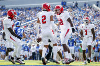 Youngstown State linebacker Keon Freeman (52) celebrates after an interception by defensive back Troy Jakubec (2)during the first half of an NCAA college football game against Kentucky in Lexington, Ky., Saturday, Sept. 17, 2022. (AP Photo/Michael Clubb)