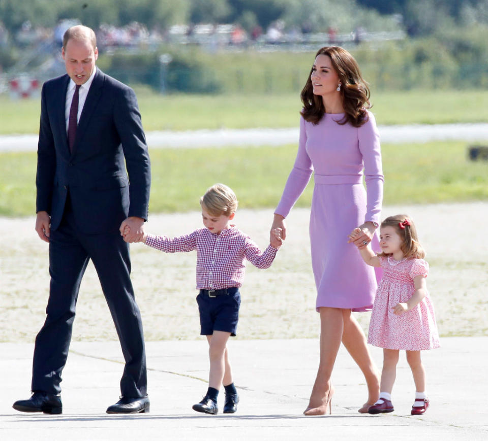 Prince William, Duke of Cambridge, Prince George of Cambridge, Princess Charlotte of Cambridge and Catherine, Duchess of Cambridge view helicopter models H145 and H135 before departing from Hamburg airport on the last day of their official visit to Poland and Germany on July 21, 2017 in Hamburg, Germany.