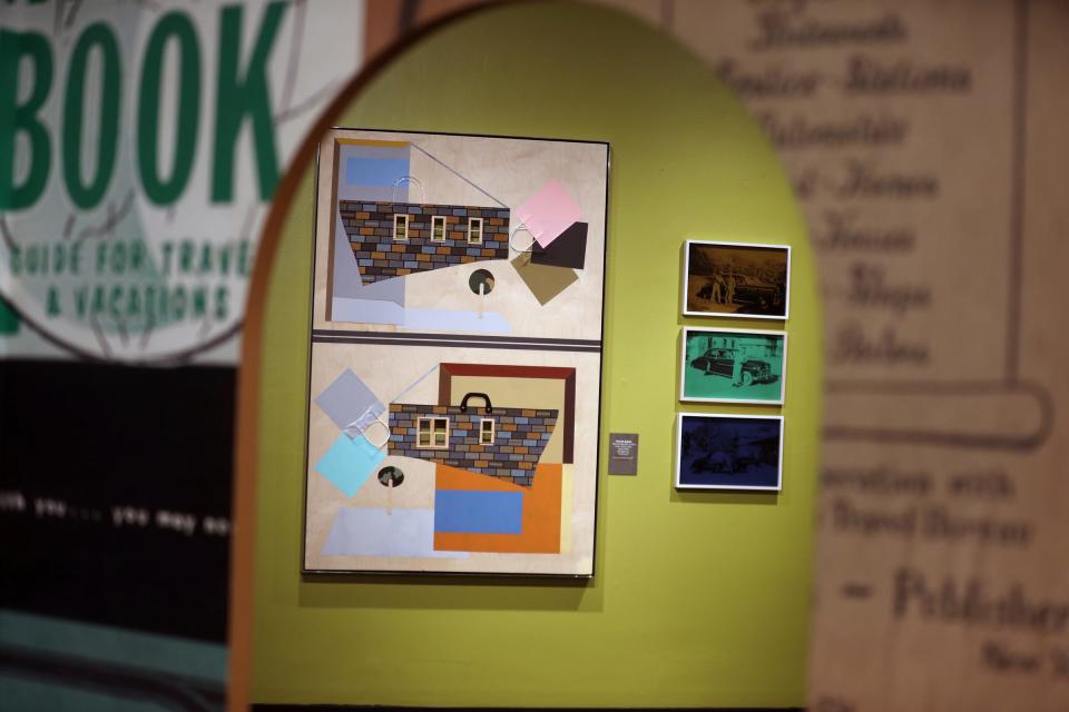 A piece called "Shop With Us," by Derrick Adams, on display at the Charles H. Wright Museum of African American History on Thursday, June 22, 2023.