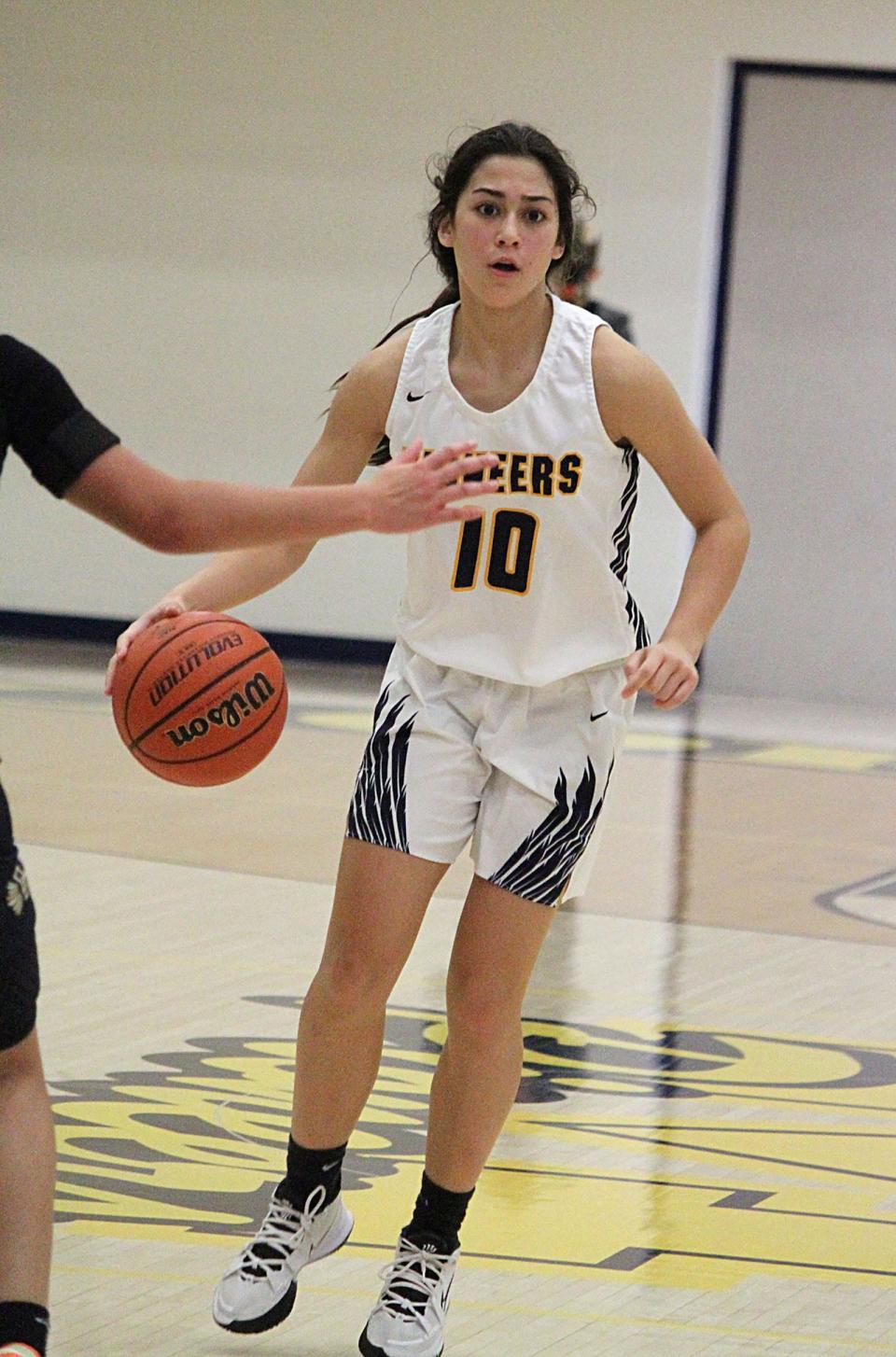 Mooresville sophomore Sydney Hardy brings the ball down the court during during Friday's Mid-State Conference game against Decatur Central. 