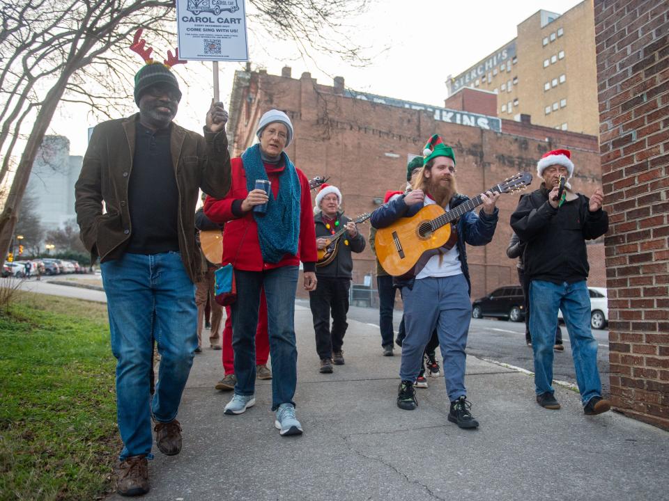 Kicking off from the parking lot of O.P. Jenkins Furniture Store, the festively dressed, colorful band of merry musicians makes its way through the heart of the Old City and downtown.