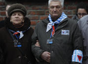 <p>Auschwitz survivors remember those killed by Nazi Germany at the execution wall of the former Auschwitz death camp on International Holocaust Remembrance Day in Oswiecim, Poland, Saturday, Jan. 27, 2018. (Photo: Czarek Sokolowski/AP) </p>