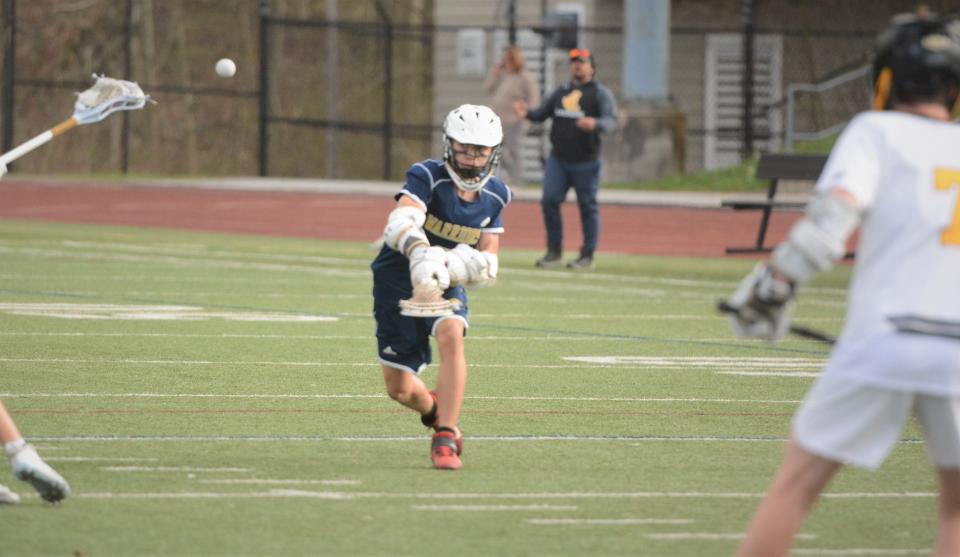 Norwich Tech-Windham Tech's Kamden Garrison fires a shot against Law during the Warriors' 10-2 loss at Milford.