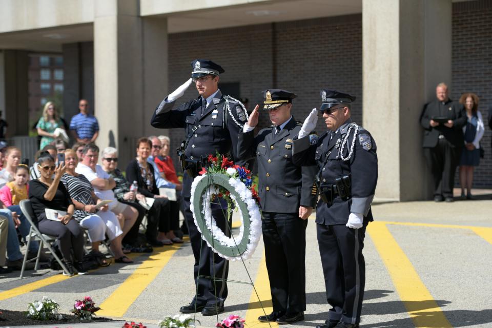 A wreath is placed near the walkway to the memorial during Sunday's annual Worcester Police Memorial Ceremony.