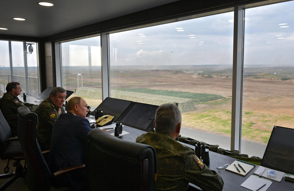 Russian President Vladimir Putin, second right, Russian Defense Minister Sergei Shoigu, right, and Russian General Staff Valery Gerasimov, second left, watch the joint strategic exercise of the armed forces of the Russian Federation and the Republic of Belarus Zapad-2021 at the Mulino training ground in the Nizhny Novgorod region, Russia, Monday, Sept. 13, 2021. The military drills attend by servicemen of military units and divisions of the Western Military District, representatives of the leadership headquarters and personnel of military contingents of the armed forces of Armenia, Belarus, India, Kazakhstan, Kyrgyzstan and Mongolia. (Alexei Druzhinin, Sputnik, Kremlin Pool Photo via AP)