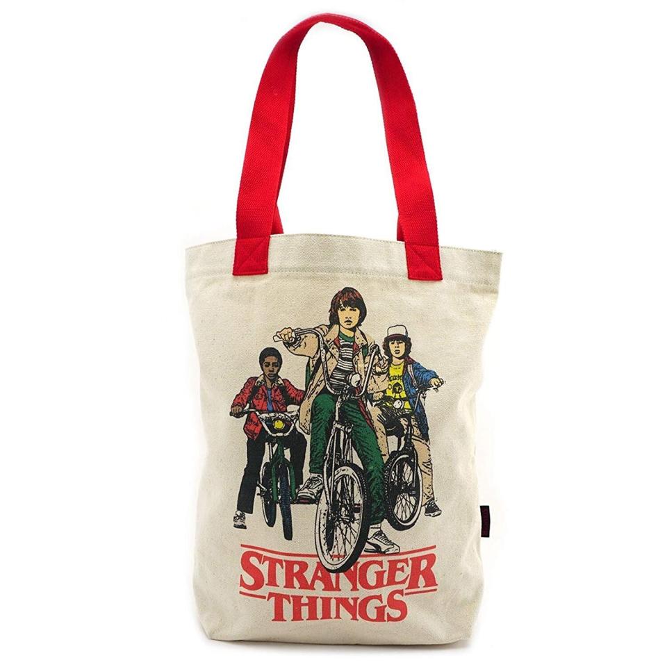 Keep those groceries fresh with this stylin&rsquo; &lsquo;80s-inspired tote. <strong><a href="https://www.amazon.com/Stranger-Things-Bikes-Canvas-Tote/dp/B078YZJVKY/ref?tag=thehuffingtop-20" target="_blank" rel="noopener noreferrer">Find it on Amazon.&nbsp;</a></strong>
