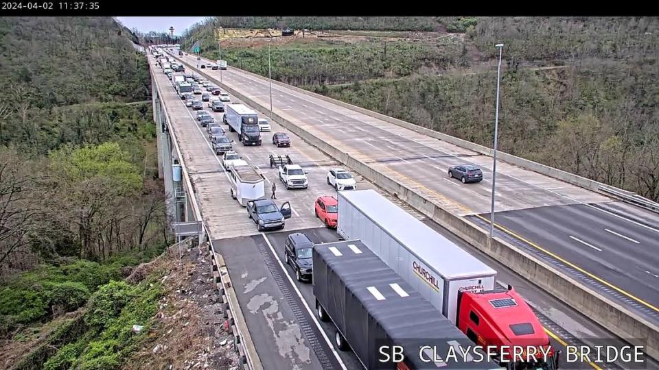 Traffic in the southbound lanes of I-75 at the Clays Ferry Bridge is backed up after the interstate was closed due to storm debris and downed wires in the road. Kentucky Transportation Cabinet