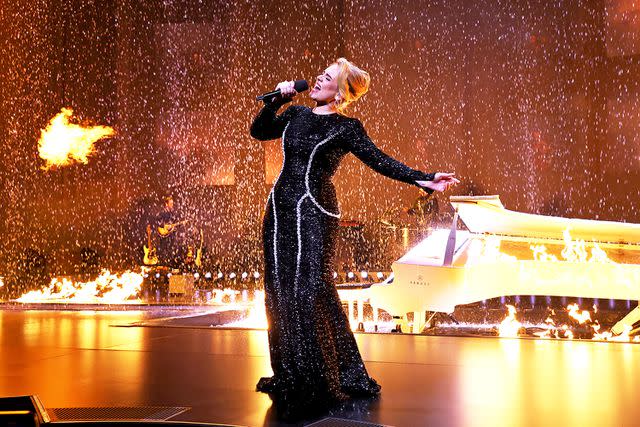 <p>Kevin Mazur/Getty</p> Adele performs onstage during "Weekends with Adele" in January