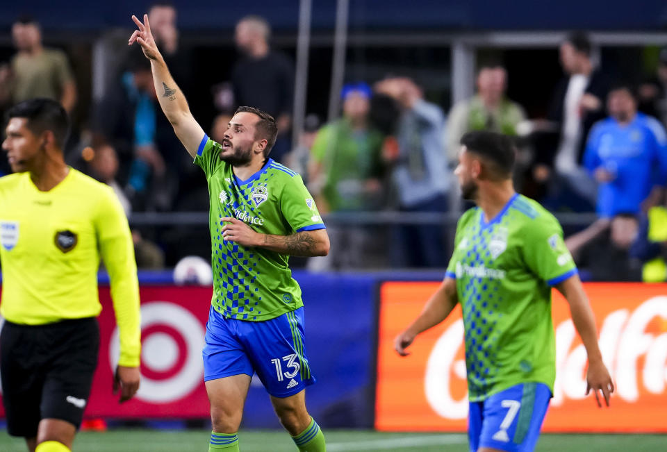 Seattle Sounders forward Jordan Morris (13) gestures to fans after scoring a goal against the LA Galaxy during the first half of an MLS soccer match Wednesday, Oct. 4, 2023, in Seattle. (AP Photo/Lindsey Wasson)