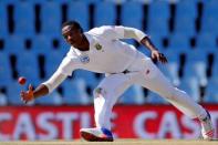 Cricket - New Zealand v South Africa - second cricket test match - Centurion Park, Centurion, South Africa - 29/8/2016. South Africa's Kagiso Rabada attempts to field a ball. REUTERS/Siphiwe Sibeko