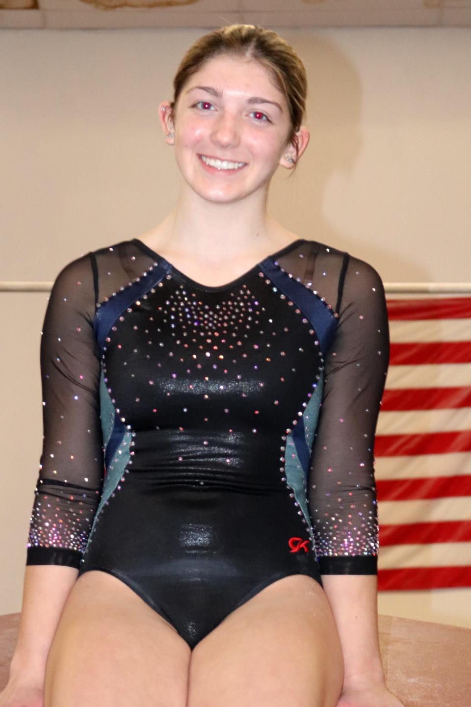Groton-Dunstable gymnast Samantha DiFonte won the all-around title at the Mid-Wach League Championship.