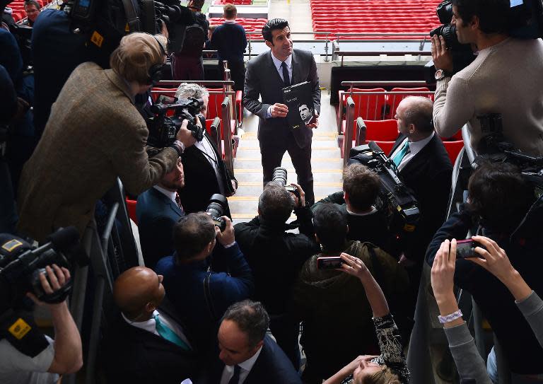 Former Portuguese football player and FIFA presidential candidate Luis Figo presents his campaign manifesto 'For Football' at the start of his presidential campaign, at London's Wembley Stadium on February 19, 2015