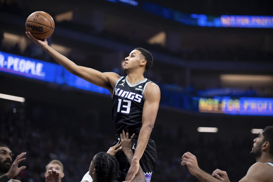 Sacramento Kings forward Keegan Murray (13) makes a layup in the first quarter of an NBA basketball game against the Memphis Grizzlies in Sacramento, Calif., Thursday, Oct. 27, 2022. (AP Photo/José Luis Villegas)