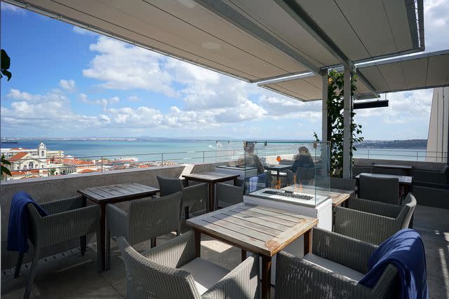 <p>Filipa Scarpa/Courtesy of Hotel Verride PalÃ¡cio Santa Catarina</p> A view from The Rooftop at Verride Palácio de Santa Catarina, in Lisbon.