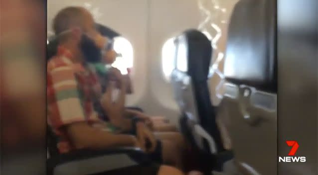 Terrified passengers were given oxygen masks. Source: 7 News