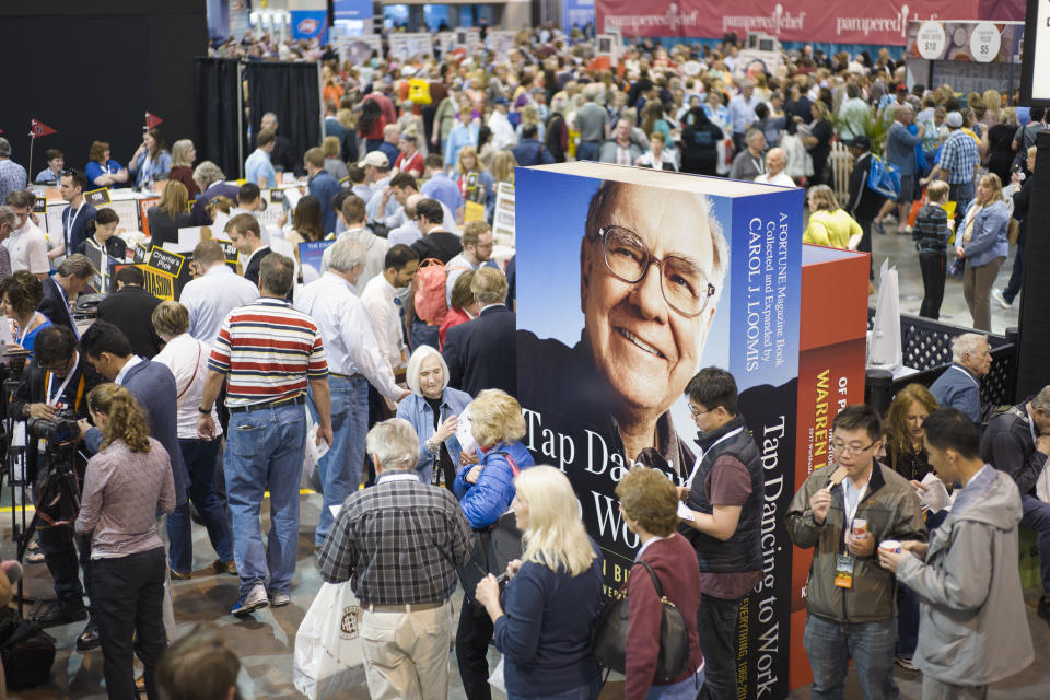 A image of Warren Buffett towers over Berkshire Hathaway shareholders as they visit and shop at company subsidiaries in Omaha, Neb., Friday, May 5, 2017, at the Berkshire Hathaway shareholders meeting. (AP Photo/Nati Harnik)