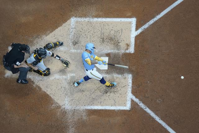 Tag at home plate caps Brewers' 4-3 victory over Pirates