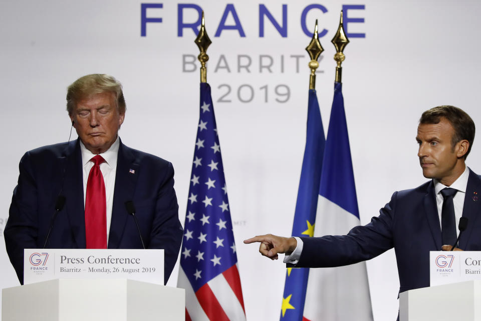 French President Emmanuel Macron, right, and U.S President Donald Trump attend the final press conference during the G7 summit Monday, Aug. 26, 2019 in Biarritz, southwestern France. (AP Photo/Francois Mori)