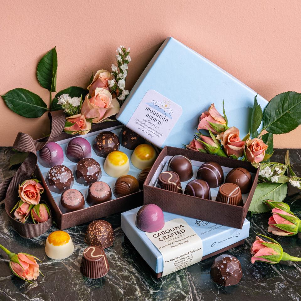 French Broad Chocolate's Mountain Mamas Chocolate Collection features flavors inspired by local mother-founded local businesses like Poppy Popcorn, Chai Pani, Buggy Pops, Curate and Sarilla.