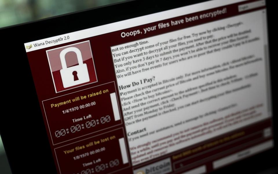 A lock screen from a cyber attack warns that data files have been encrypted on a laptop computer in this arranged photo in London, U.K., on Monday, May 15, 2017. Governments and companies around the world began to gain the upper hand against the first wave of an unrivaled global cyberattack, even as the assault was poised to continue claiming victims this week. Photographer: Simon Dawson/Bloomberg - Simon Dawson/Bloomberg