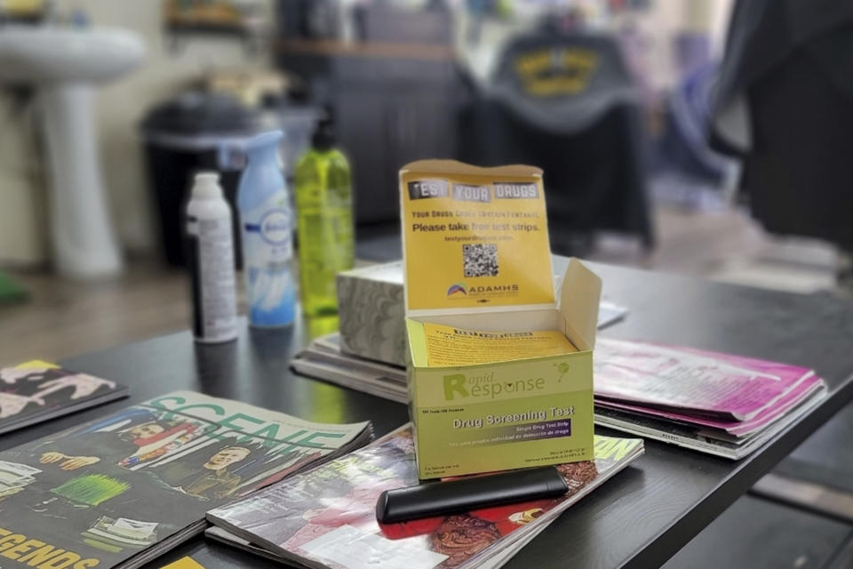 Fentanyl test strips sit atop magazines in the waiting area of Urban Kutz Barbershop in Cleveland, Ohio, on April 11, 2023. Owner Waverly Willis sets them out in his businesses, hoping to protect people in his community from overdosing on drugs they're unaware contain the dangerous synthetic opioid fentanyl. A growing number of states are legalizing the test strips, which are often labeled as illegal drug paraphernalia, in an effort to prevent overdose deaths. (Waverly Willis via AP)