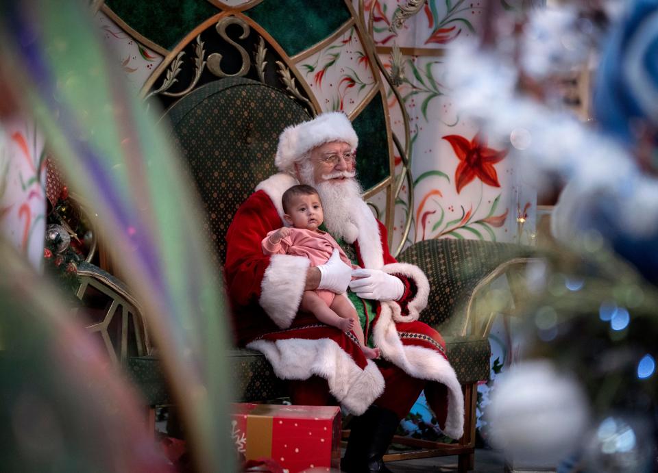 Santa was at The Gardens Mall on Black Friday and will be there through Dec. 24.