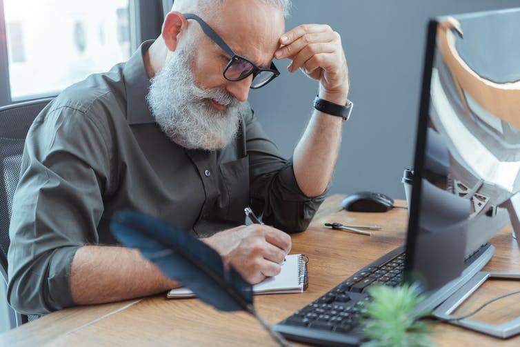 <span class="caption">‘Don’t mind me, just writing down all my passwords for when I die’.</span> <span class="attribution"><span class="source">Shutterstock</span></span>