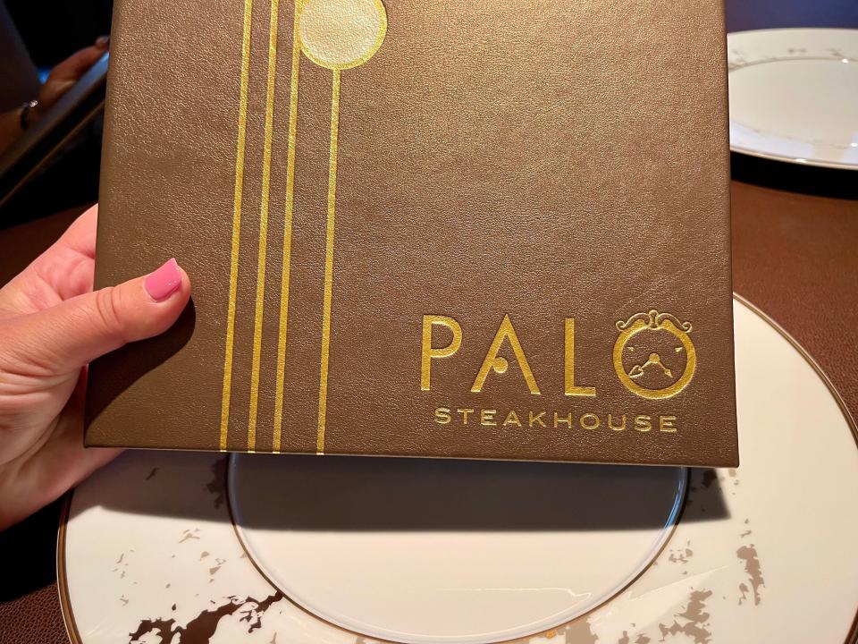 Carly Caramanna disney wish holding palo steakhouse menu