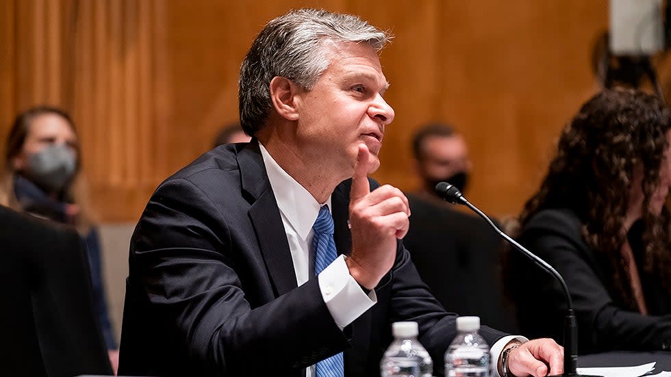 FBI Director Christopher Wray makes an opening statement during a Senate Homeland Security & Governmental Affairs Committee hearing to discuss security threats 20 years after the 9/11 terrorist attacks on Tuesday, September 21, 2021.