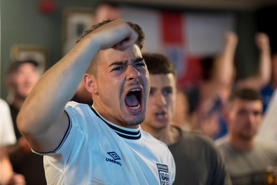 <p>Fans at the The Lord Stamford pub in Manchester went wild as England proved victorious in the penalty shootout. (Picture: Getty) </p>