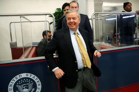 U.S. Senator Lindsey Graham (R-SC) arrives ahead of a vote on a bill to renew the National Security Agency's warrantless internet surveillance program, at the U.S. Capitol in Washington, U.S. January 18, 2018. REUTERS/Jonathan Ernst