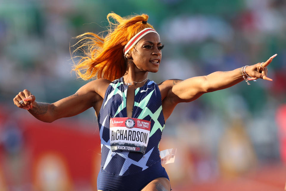 Sha'Carri Richardson runs and celebrates in the Women's 100 Meter semifinal.