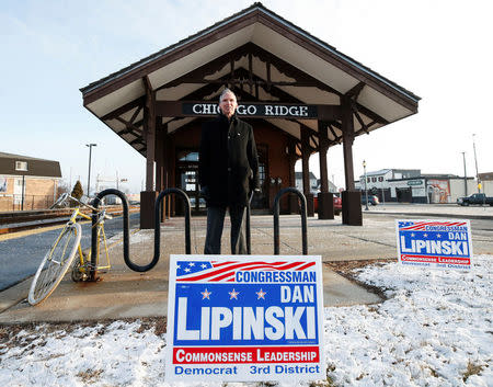 U.S. Congressman Daniel Lipinski poses for a picture after campaigning for re-election at the Chicago Ridge Metra commuter train station in Chicago Ridge, Illinois, U.S. January 25, 2018. Picture taken January 25, 2018. REUTERS/Kamil Krzacznski