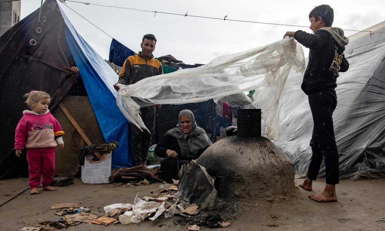 <span>UNRWA is providing aid to nearly 2 million Palestinians in Gaza, where it has 13,000 staff.</span><span>Photograph: Haitham Imad/EPA</span>