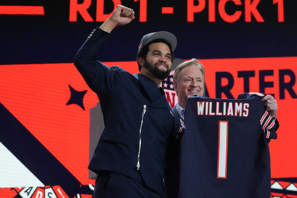 Southern California Trojans quarterback Caleb Williams poses with NFL commissioner Roger Goodell after being selected by the Chicago Bears as the No. 1 pick in the first round of the 2024 NFL Draft at Campus Martius Park and Hart Plaza.