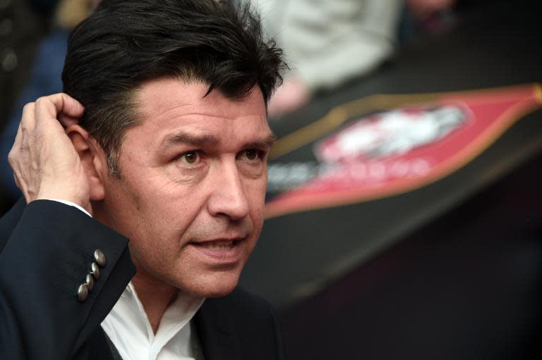 Lyon's head coach Hubert Fournier attends a French Ligue 1 match against Rennes, at the route de Lorient stadium in Rennes, western France, on May 23, 2015