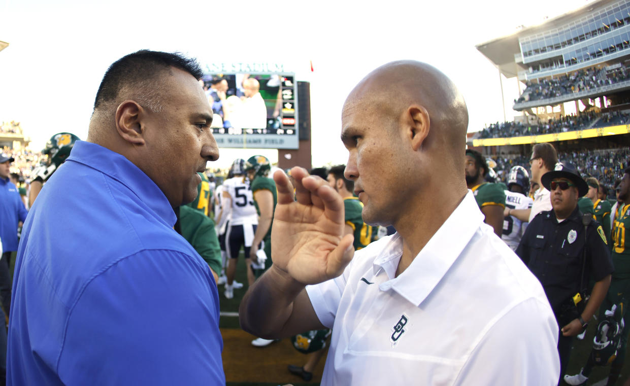 BYU head coach Kalani Sitake, left, will see his team square off against Baylor, led by head coach Dave Aranda, on Saturday in an intriguing matchup of top 25 teams. (AP Photo/Ron Jenkins, File)