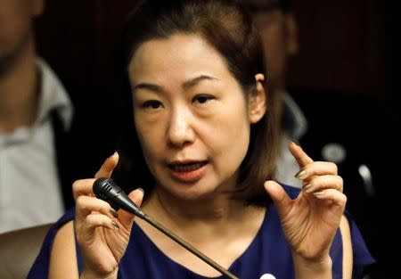 Choi Kyung-jin, wife of South Korean businessman Jee Ick-joo who was killed inside a police headquarters, testifies during a senate investigation in Pasay, Metro Manila, Philippines January 26, 2017. Picture taken January 26, 2017. REUTERS/Erik De Castro